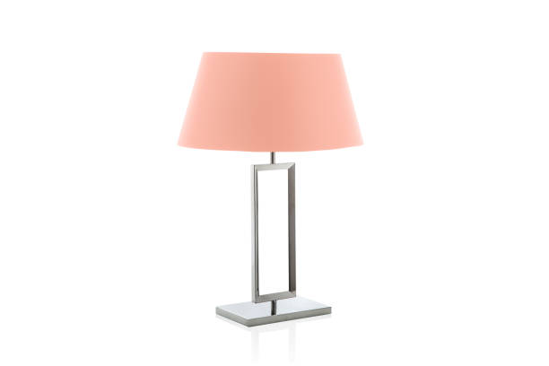 istock Modern table lamp with small salmon lampshade isolated 1059144556