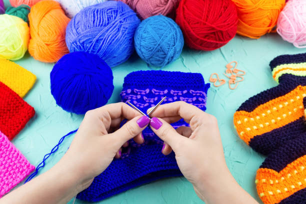 istock girl knits sock knitting needles 1059146822