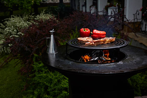 istock Tomahawk rib beef steak and T-bone on hot black grill. 1059146938