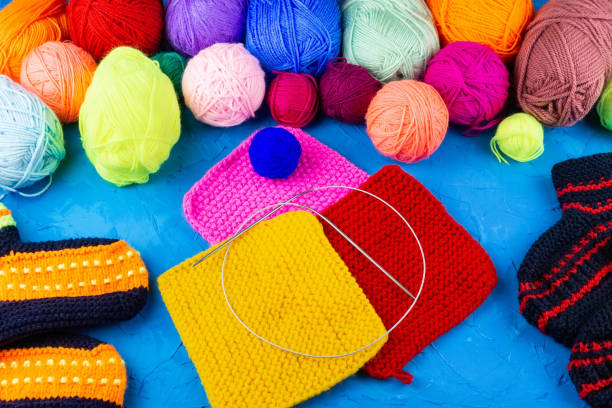 istock girl knits sock knitting needles 1059147062