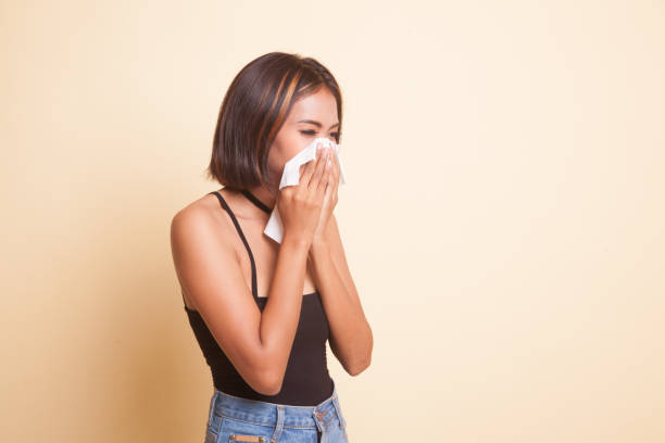 istock Young Asian woman got sick and flu. 1059153802