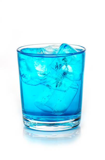 istock blue drink with ice cubes on white background, isolated 1059156346