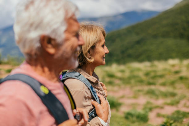 istock Senior couple hiking together 1059156556