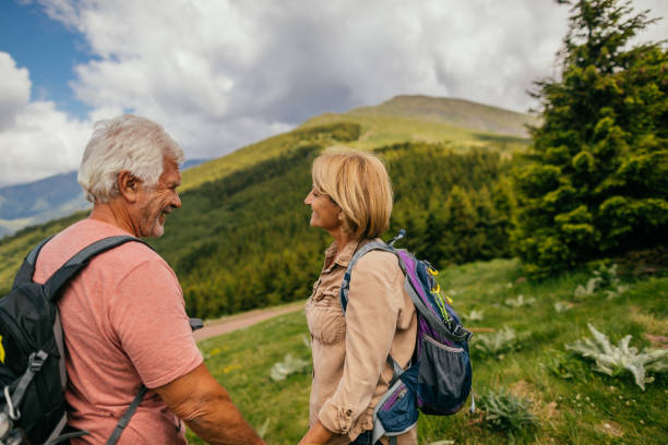 istock Senior couple hiking together 1059156696