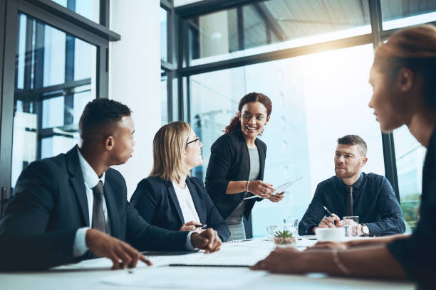 istock Informing her team of her latest ideas 1059157368