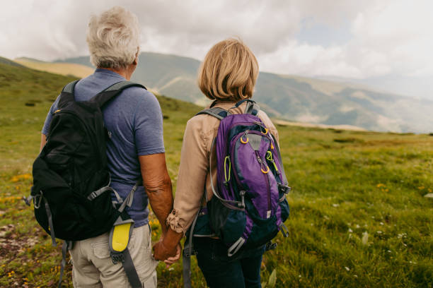 istock Active seniors hiking together 1059158758