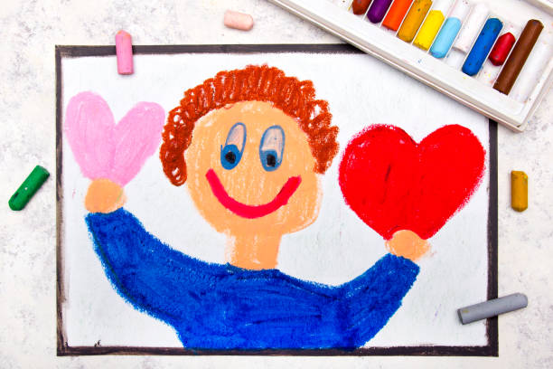 istock Colorful drawing: A smiling boy holds in hands two hearts. 1059162280