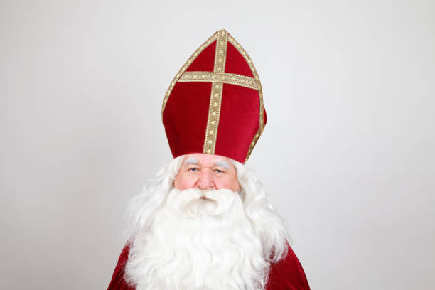 istock Saint Nicholas is looking at you on white 1059163430