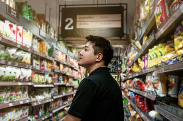 A man shopping in supermarket