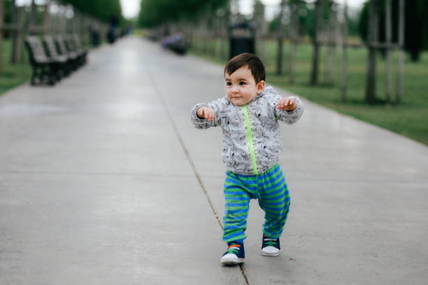 istock Walking baby in the park 1059180366