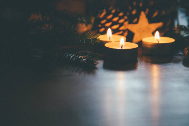 istock Christmas candles in the night 1059184560