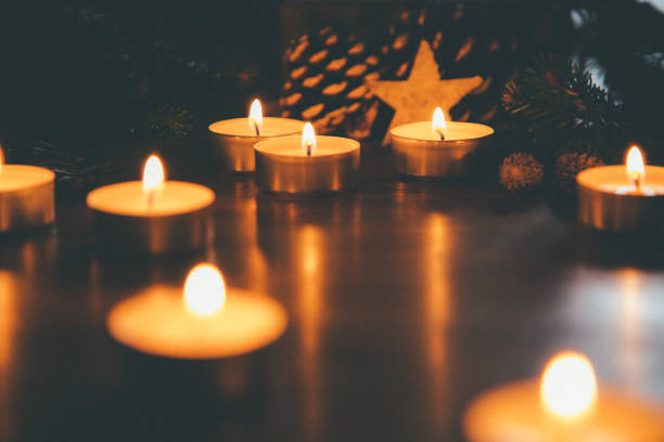 istock Christmas candles with ornaments in the night 1059184664