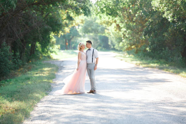 istock wedding couple on the nature in summer day. 1059202632