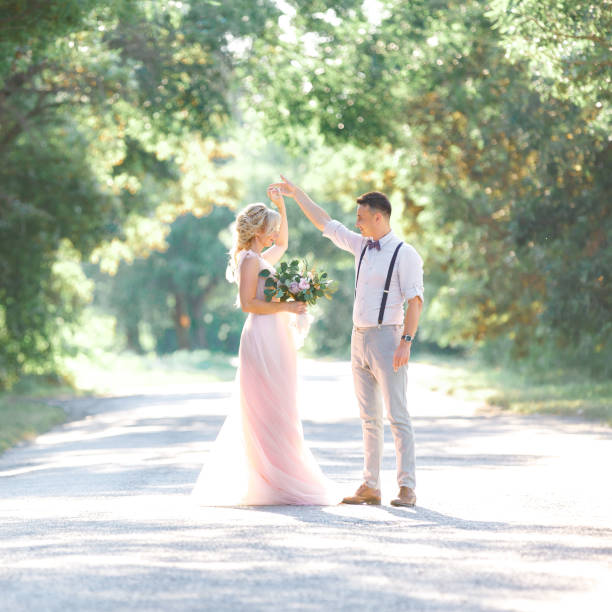 istock wedding couple on the nature in summer day. 1059202780