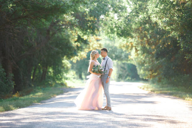 istock wedding couple on the nature in summer day. 1059202804
