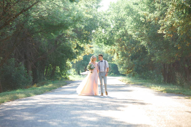 istock wedding couple on the nature in summer day. 1059202814