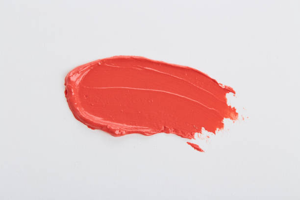 istock Smudged pink lipstick on white background 1059203406