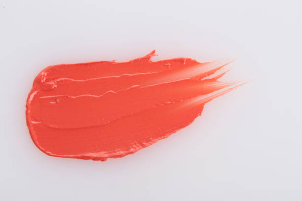 istock Smudged pink lipstick on white background 1059203432