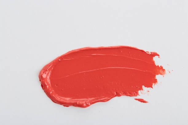 istock Smudged pink lipstick on white background 1059203512