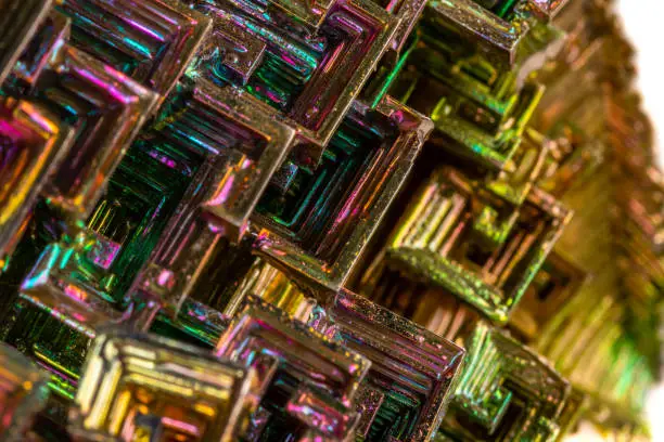 Macro of the mineral bismuth stone on a white background close-up