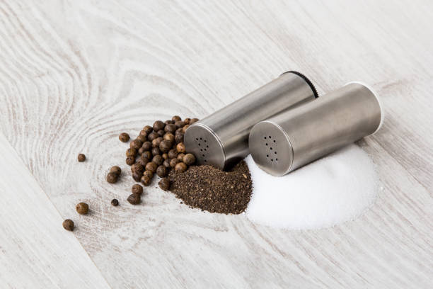 istock Metal salt and pepper shaker on white background 1059205860