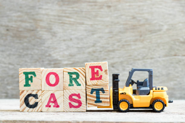 istock Toy forklift hold letter block e, t to complete word forecast on wood background 1059213682