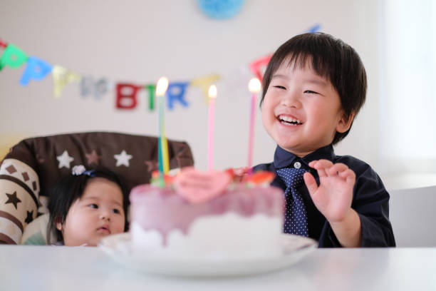 istock Toddler, baby, and birthday cake 1059215158