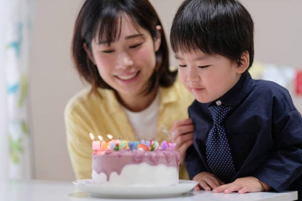 istock Mother celebrating her son's birthday at home 1059218532