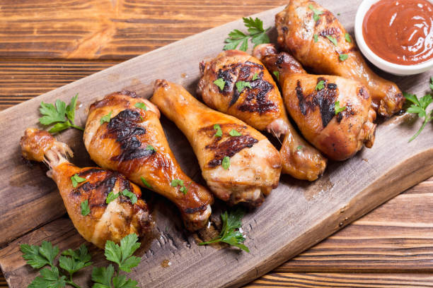 istock Grilled chicken legs with tomato sauce 1059223664