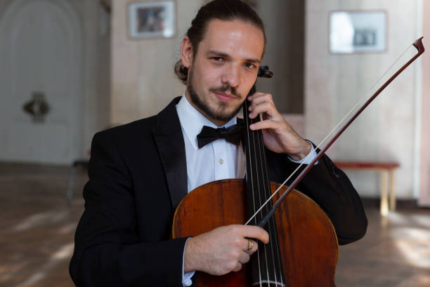 istock Young cellist playing the cello 1059223808