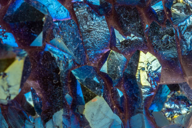 Macro mineral stone Titanium Quartz, Flame Aura Quartz on a white background close-up