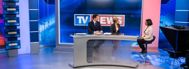 istock Journalists Sitting With Businesswoman 1059228126