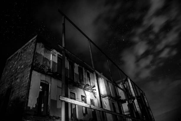 istock Old abandoned house at night 1059228338