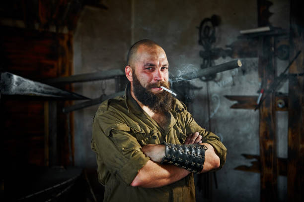 istock Portrait of a  bearded hard worker. He smokes after hard work. 1059228528