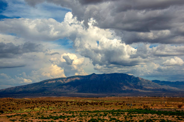 istock Sandia Mountains with Majestic Sky and Clouds 1059236494