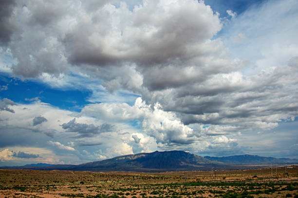 istock Sandia Mountains with Majestic Sky and Clouds 1059236994