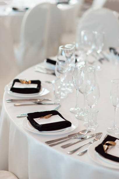 istock Sparkling glassware stands on table prepared for wedding. Wedding decor, interior. Festive. Banquet table. 1059237002