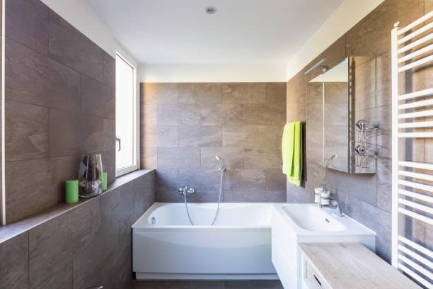 istock Elegant bathroom with dark tiles 1059237914