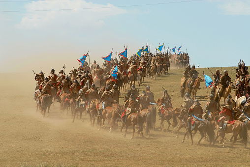 Ulaanbaatar, Mongolia - August 17, 2006: Unidentified Mongolian horse riders take part in the traditional historical show of Genghis Khan era in Ulaanbaatar, Mongolia.