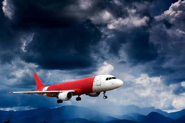istock Airplane in the sky and cloud 1059241368