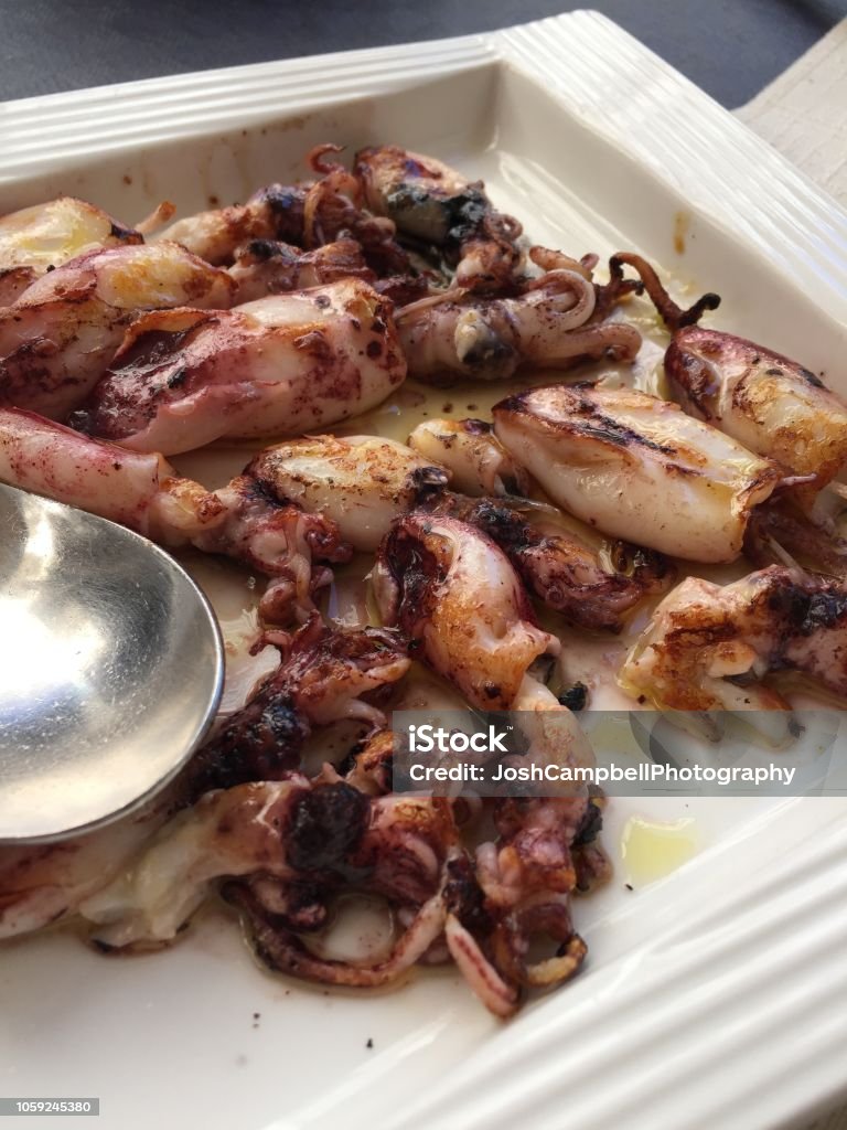 Cooked Baby Squid Stock Photo - Download Image Now - Barbecue - Meal