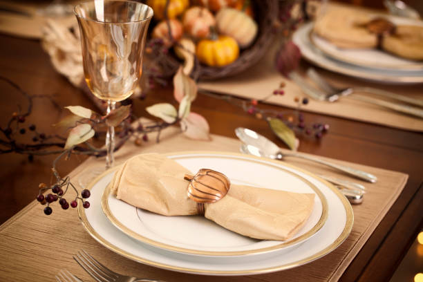 Luxury hotel/home table setting for fine dining. With glassware and blurred background.