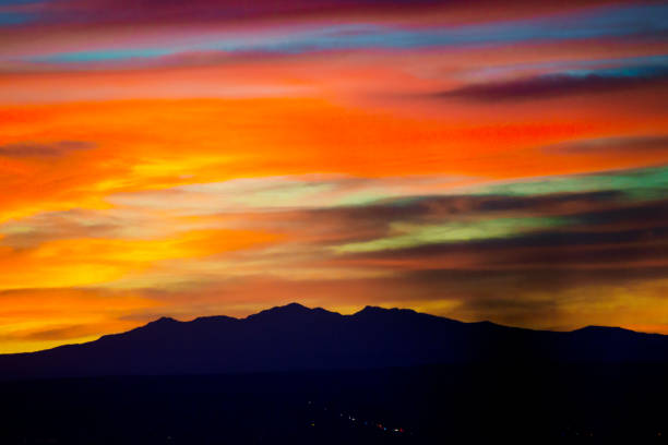 istock Sandia Mountains with Majestic Sky and Clouds at Sunset 1059247788