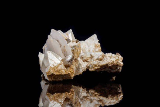 istock Macro mineral stone Snow quartz with calcite on a black background 1059249110