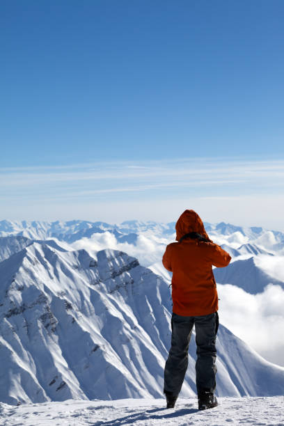 istock Skier on top of snow mountains 1059249278
