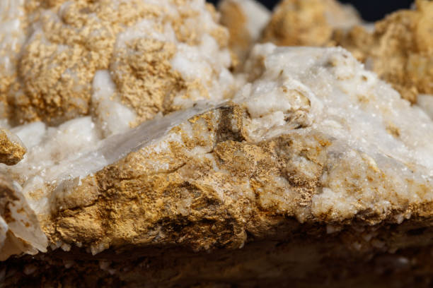 istock Macro mineral stone Snow quartz with calcite on a black background 1059250874