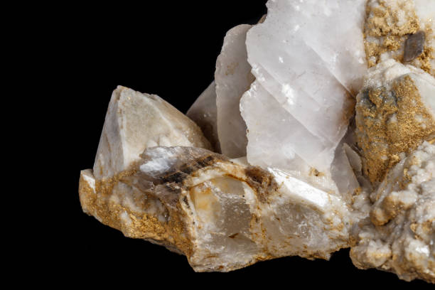 istock Macro mineral stone Snow quartz with calcite on a black background 1059251140