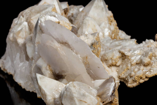 istock Macro mineral stone Snow quartz with calcite on a black background 1059251372