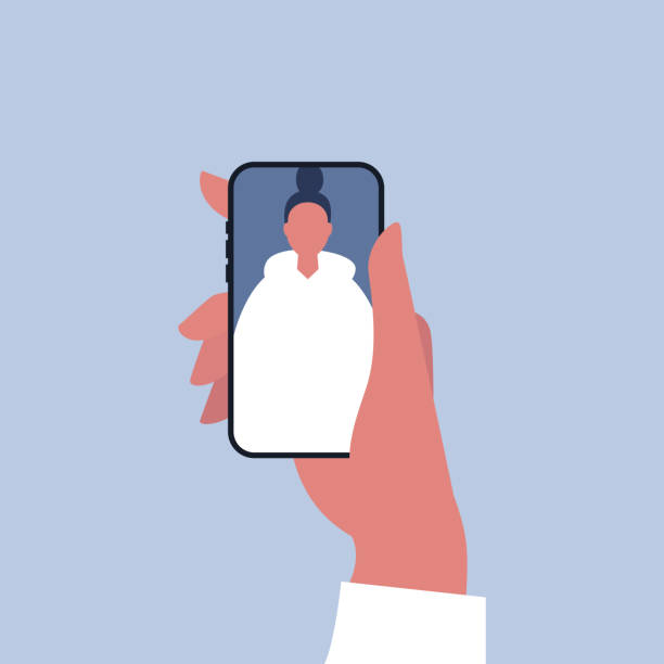 Social media. Hand holding a smartphone. An image of young female character on a mobile display Social media. Hand holding a smartphone. An image of young female character on a mobile display hand holding phone stock illustrations