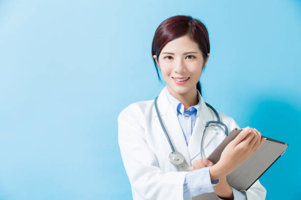 istock woman doctor take tablet pc 1059254476